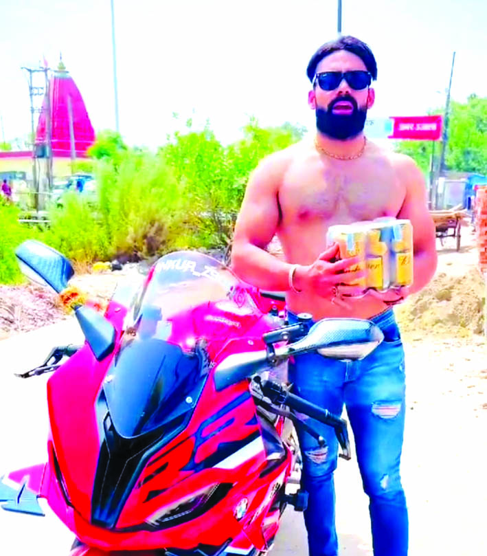Half-naked man fined for distributing beer cans at ‘dry area’ of Haridwar