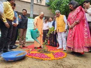 CM Yogi plants red sandalwood plant at official residence in Lucknow